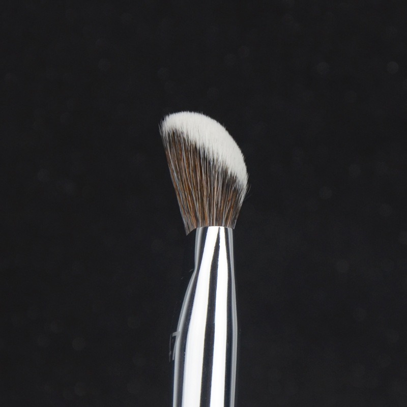 Side profile of Foundation Brush 47 head and silver-colored ferrule